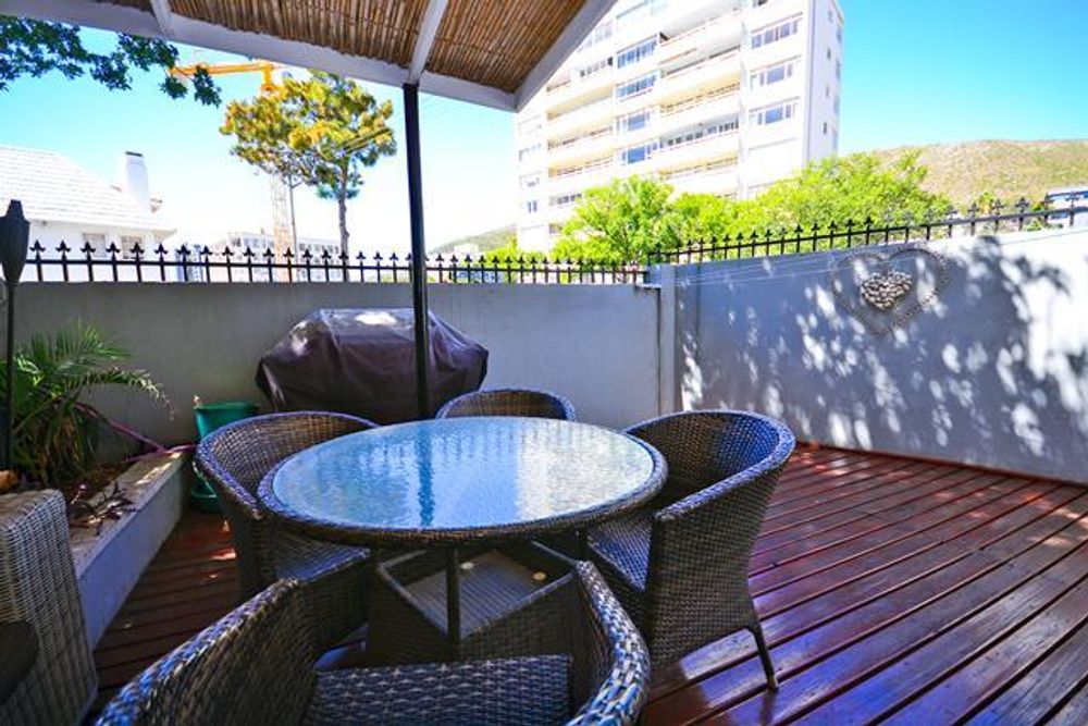 Boundary wall recently changed and has wooden structure for privacy