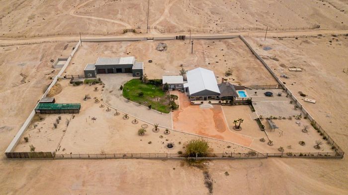 For Sale: Nonidas Small Holding with 7 bedrooms, garage, pool, and development potential.