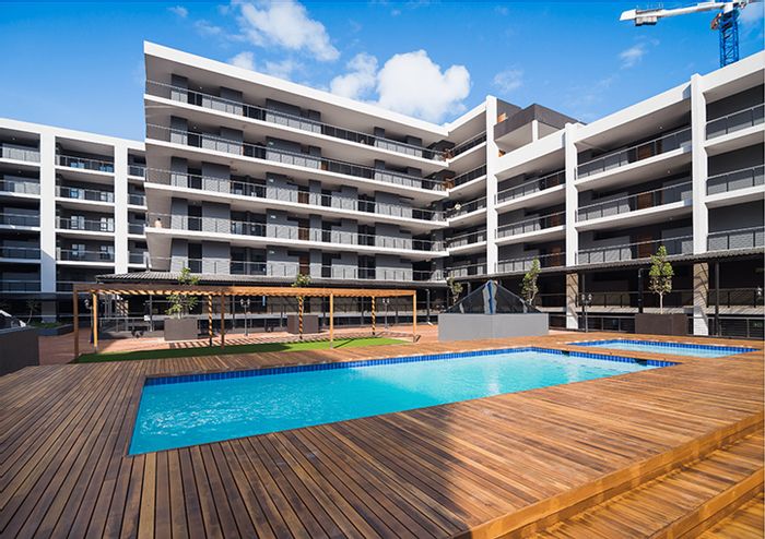 Umhlanga Ridge Apartment For Sale: 1 bed, pool, gym, balcony, secure parking.