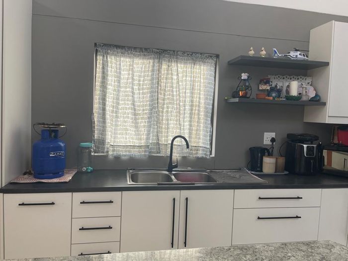 House for sale in Matatura: 2 bedrooms, garage, open plan living, alarm system.