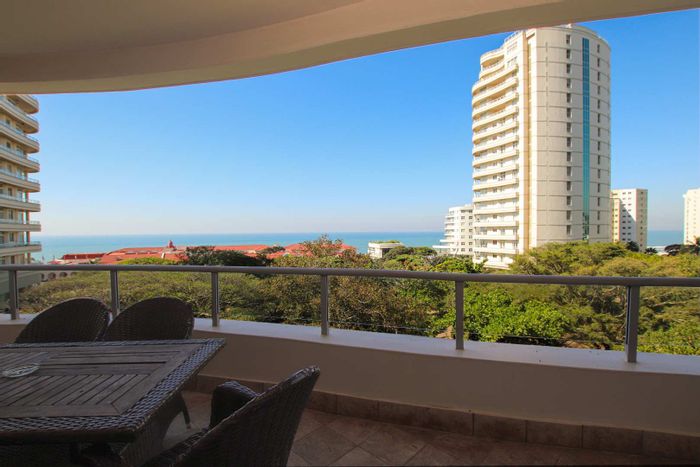 Umhlanga Central Apartment For Sale: Sea views, pools, beach access, and security.