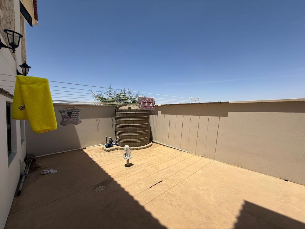 Back courtyard with laundry line