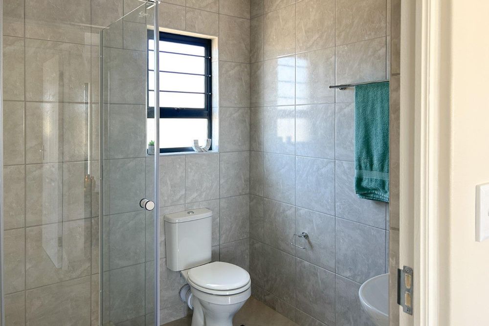 Family bathroom with shower.