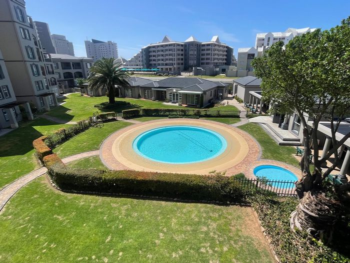 Furnished 3-Bedroom Apartment For Sale in Diaz Beach with communal pools and braai facilities.