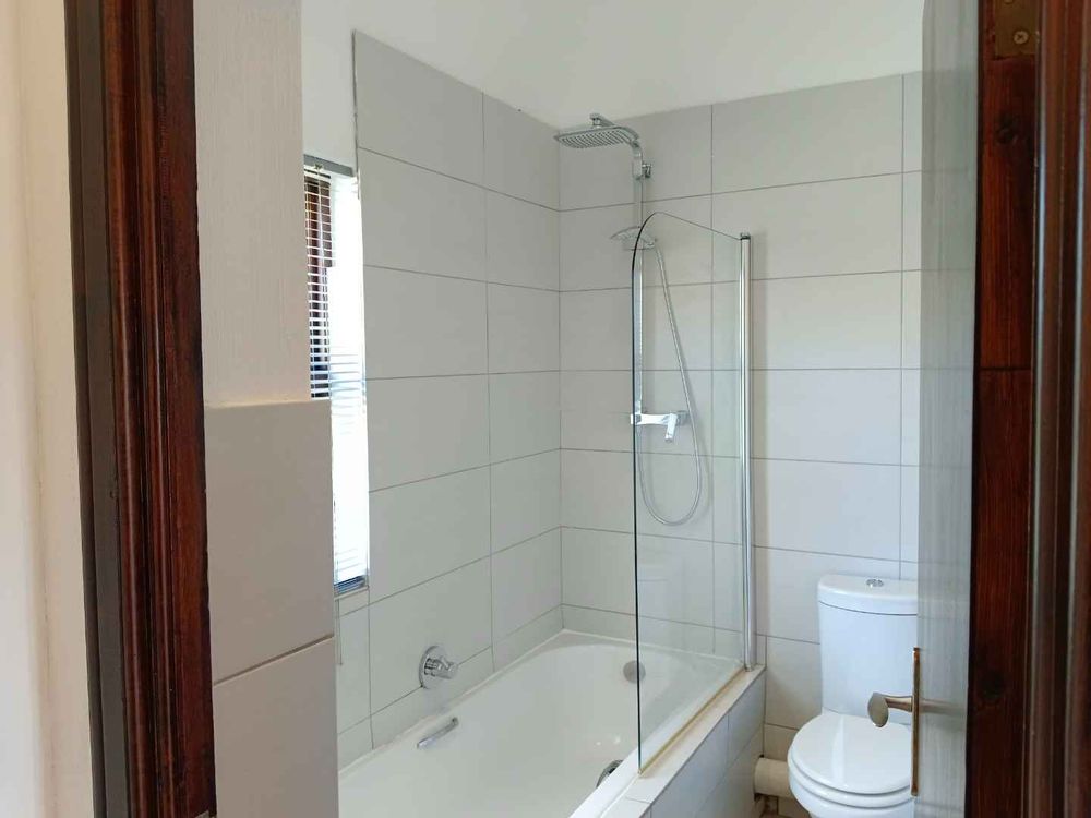 Bath with shared shower