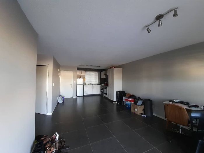 For Sale: Townhouse in Windhoek Industrial with 2 Bedrooms, parking, and storage.