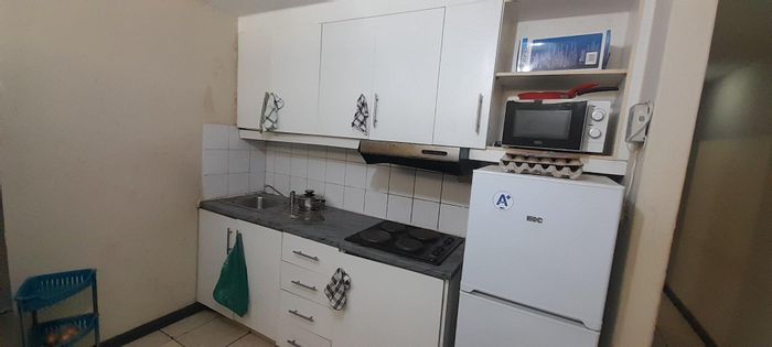 For Sale: Apartment in Durban Central with tenants, security, and rental income.
