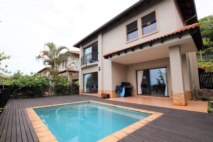 La Lucia Townhouse To Rent: 3 beds, pool, deck, security estate, pet-friendly.