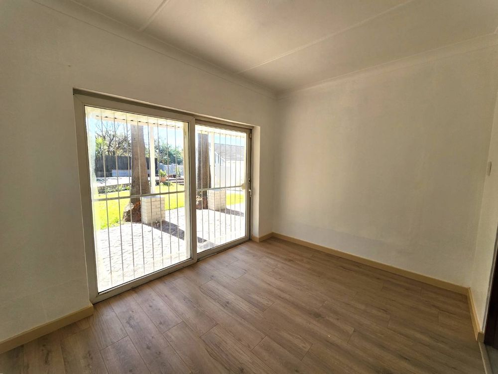 Bedroom 2 with sliding door to patio