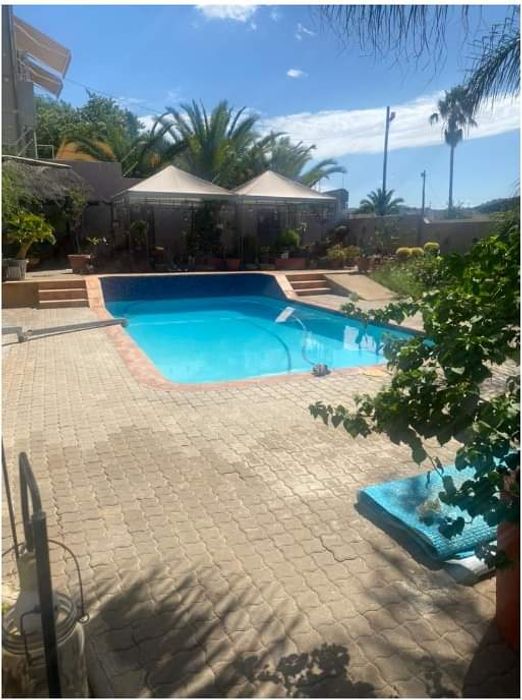 Eros House For Sale: Spacious home with flat, pool, and ample parking.