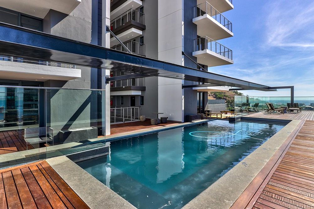 27th floor pool deck with outdoor gym, private bar & views
