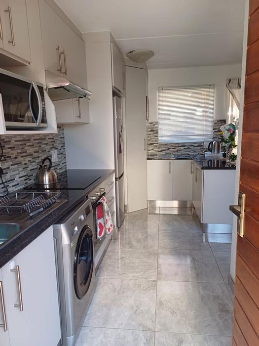 Edleen Townhouse For Sale: 2 beds, private garden, open-plan living, guest toilet.