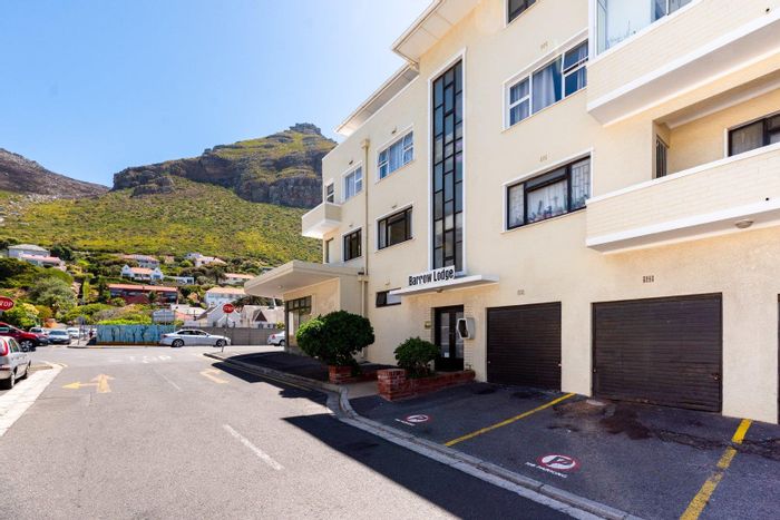 Charming Muizenberg Central Apartment For Sale: Stunning Views, Secure Living, Prime Location!