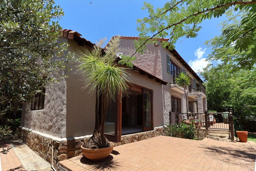 Exterior of braai room adjacent to outdoor entertainment area