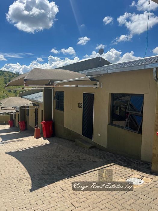 For Sale: Otjomuise Townhouse with 2 Bedrooms, Open Kitchen, and Parking for 2.