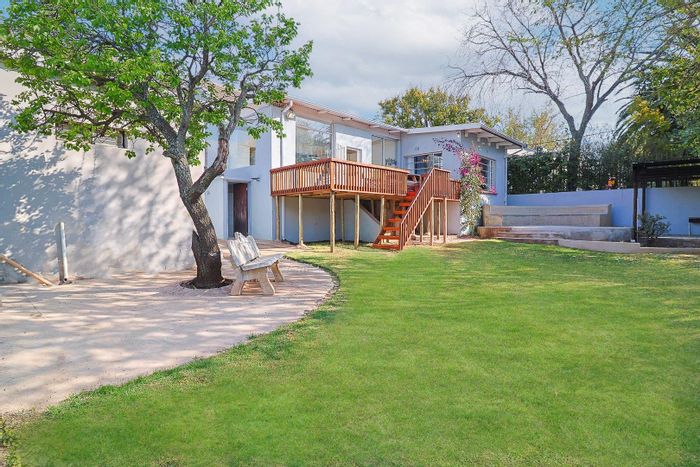 For Sale: House in Melville with garden, viewing deck, and office space.