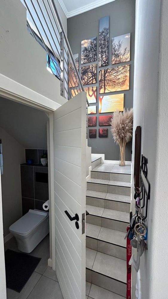 Guest toilet under the stairs