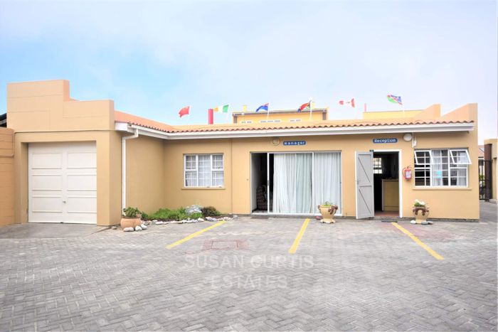 For Sale: Guest House in Swakopmund Central with 11 units, parking, and conference room.