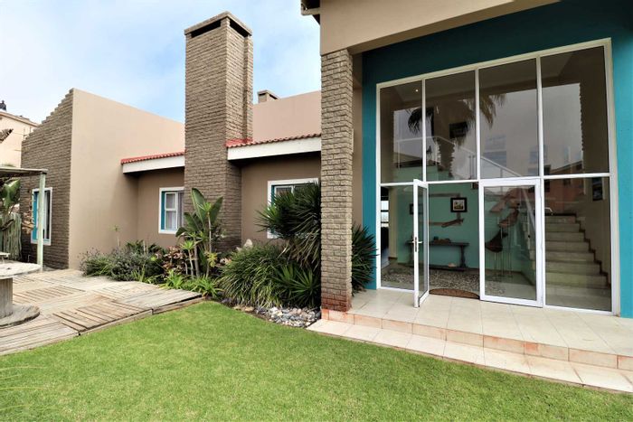 For Sale: House in Mile 4 with ocean views, 5 bedrooms, and indoor BBQ.