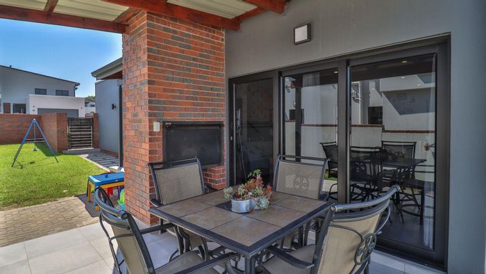For Sale: House in Craigavon with 3 bedrooms, double garage, and outdoor patio.