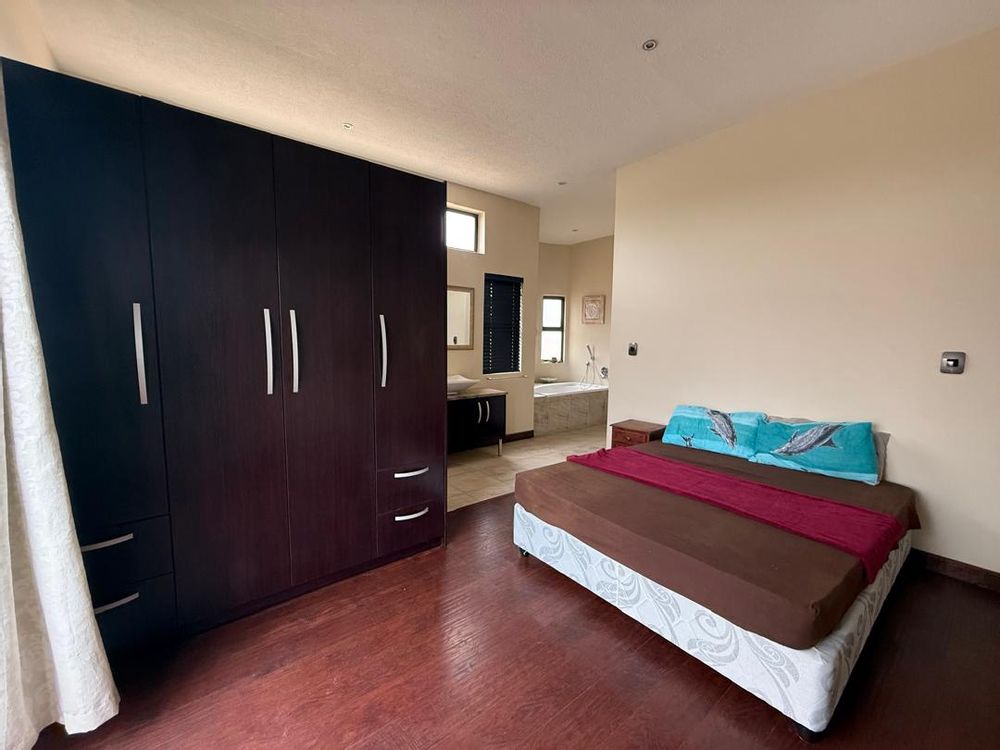 Ground floor, bedroom one, built-in cupboards and en-suite bathroom