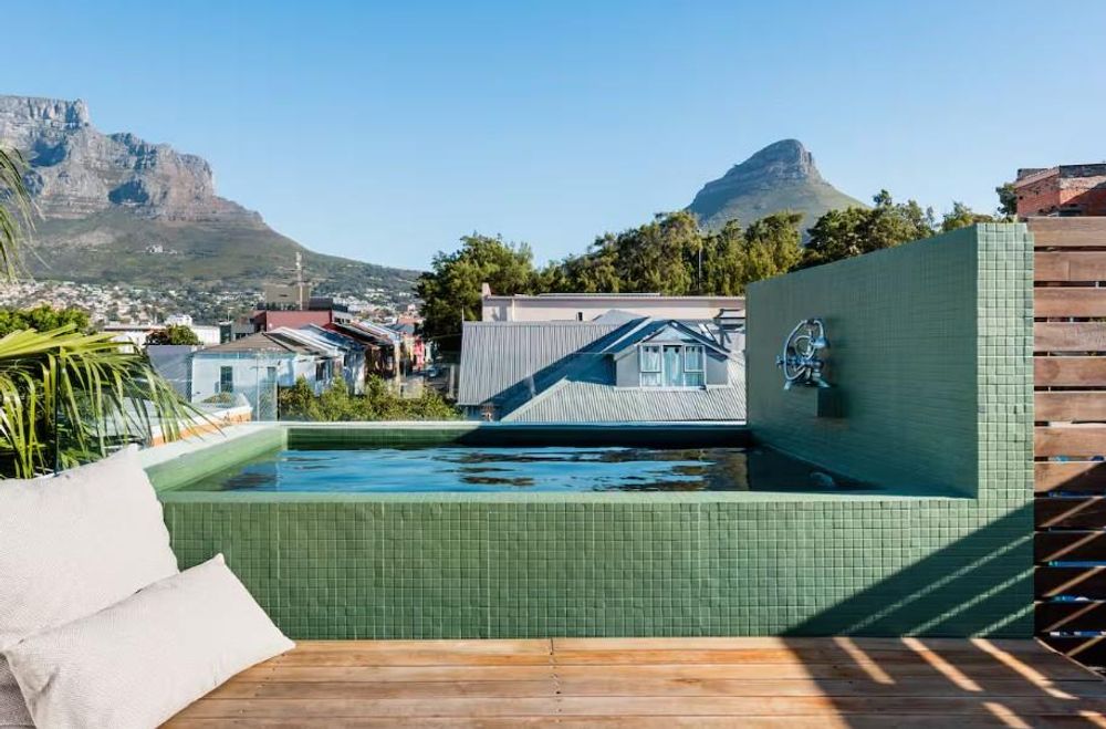 Private rooftop pool terrace with glorious Table Mountain, Lions Head and Devils Peak views