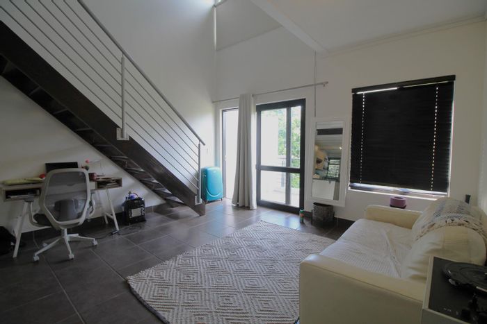 Top floor apartment in Douglasdale with balcony, pool, and 24-hour security. To Rent.
