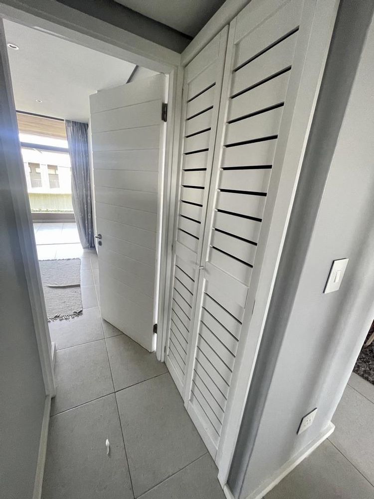 Cupboard for washing machine and dryer