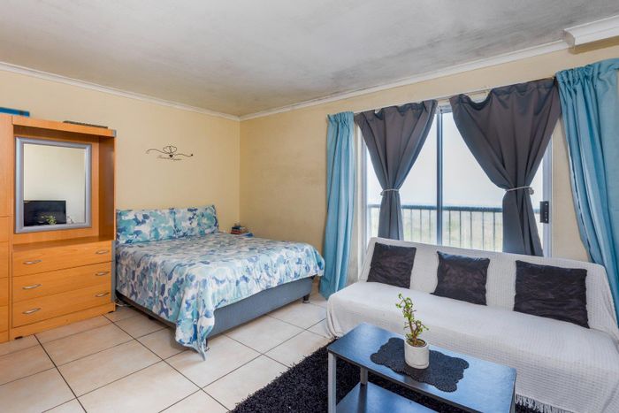 Coastal Apartment in Muizenberg Central with Pool, Clubhouse, and Stunning Views!