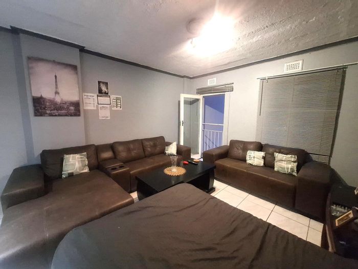 Montclair Apartment For Sale: Spacious lounge, ensuite bedroom, secure parking, investment opportunity.