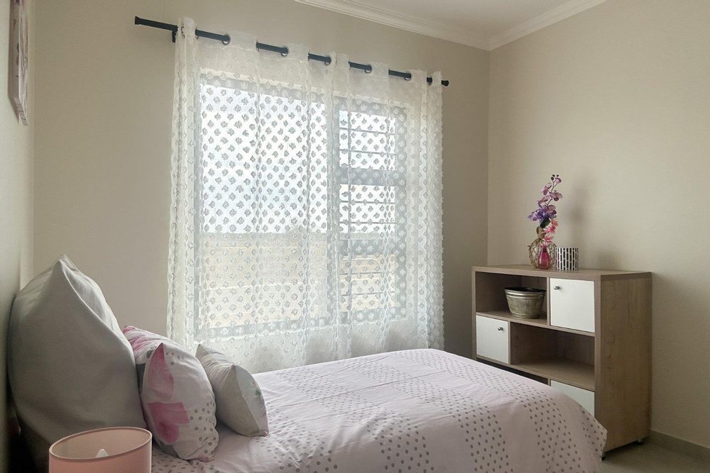 Third bedroom with built-in cupboards.