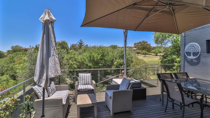 For Sale: House in Jackal Creek Golf Estate with entertainment deck, golf views, amenities.