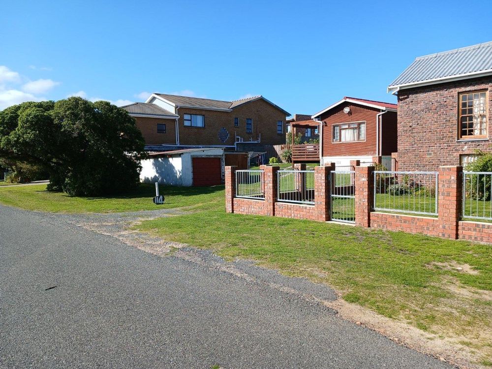 Houses across the Street. Only 2 rows of Houses in between us and the Sea.
