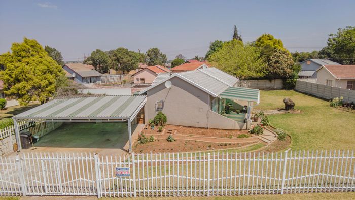 House For Sale in Sherwood Gardens: Open-plan living, large garden, double garage.