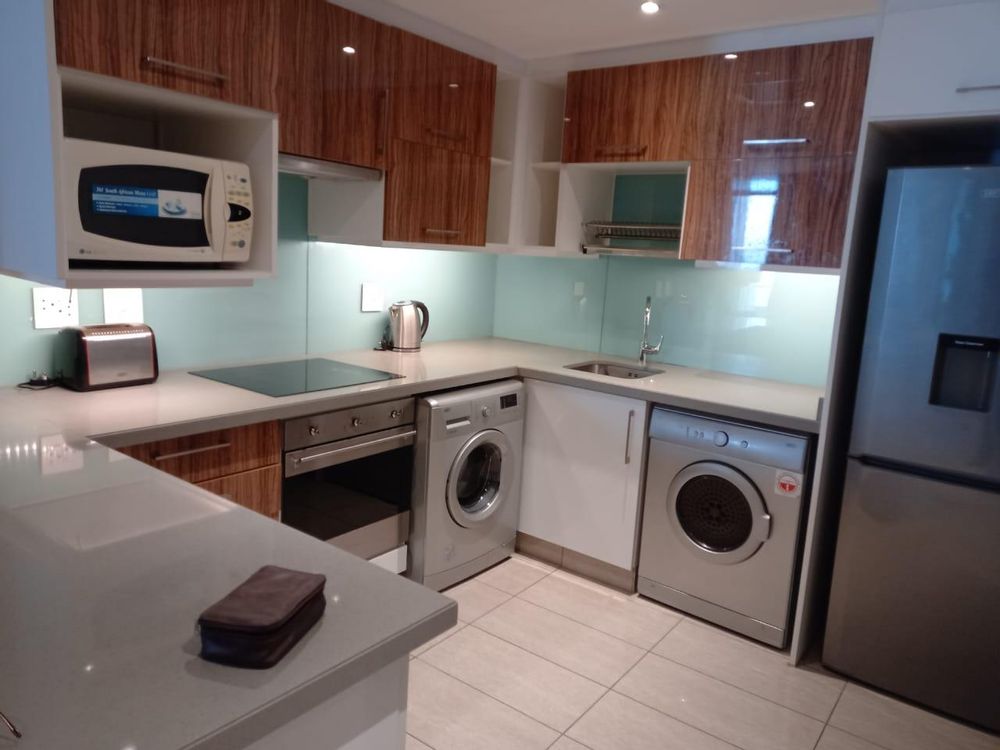 Open plan fully equipped kitchen 