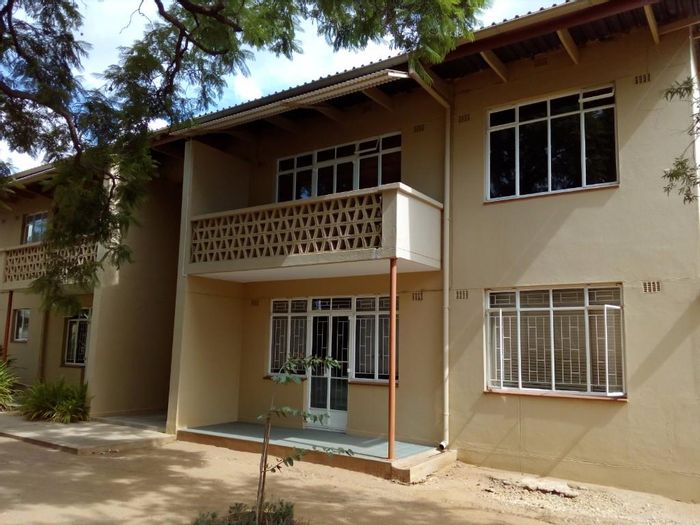 For Sale: 2-bedroom apartment in Suiderhof with balcony, parking, and laundry area.