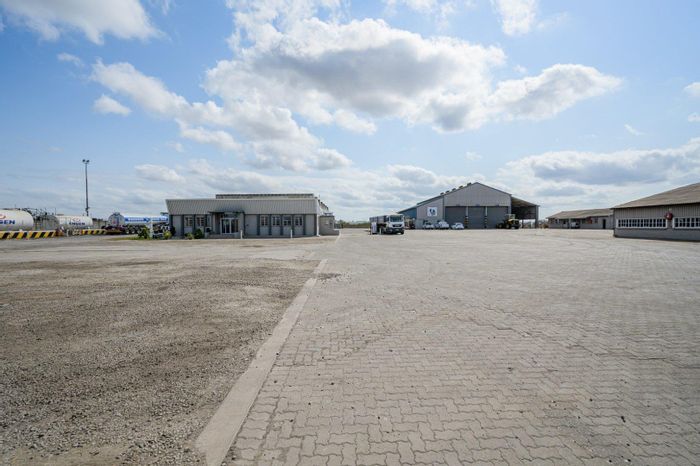 Industrial property for sale in Markman with rail access, offices, and workshops.