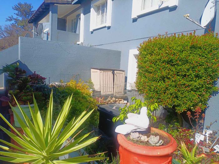 For Sale: 2-Bedroom Apartment in Malanshof with private garden and secure parking.