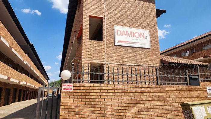 Bachelor apartment for sale in Rustenburg Central, close to amenities and schools.