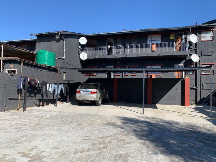 For Sale: 2-bedroom apartment in Chrisville with balcony, parking, near amenities.