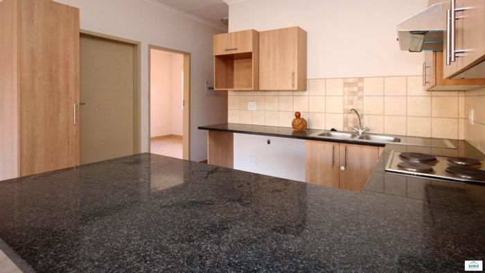 2 Bed Apartment in Olympus AH To Rent with Garage, Pool, and Security Features.