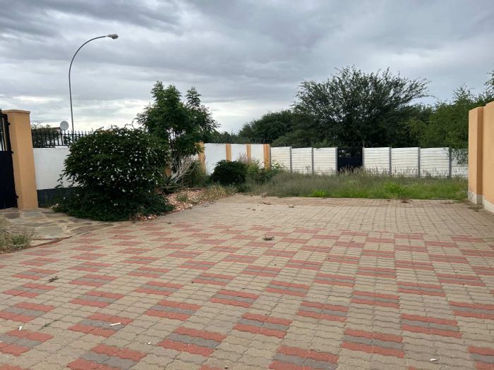 4-Bedroom House in Luxury Hill with spacious yard and secure garage For Sale.