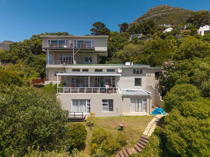 Mount Rhodes House For Sale: Income-generating apartments, pool, mountain and sea views.