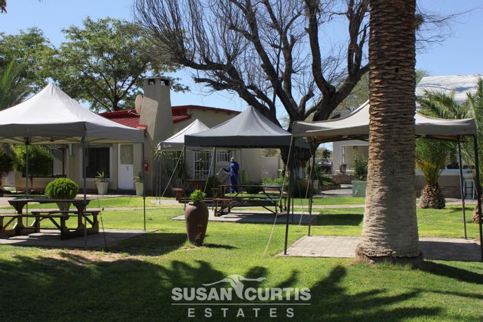 Omaruru Central Lodge For Sale: Wildlife, river access, diverse accommodations, and activities.