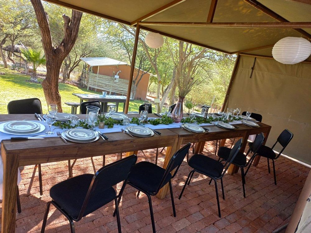 Outdoor tented dining setup