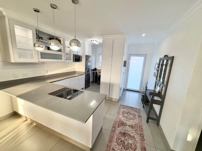 For Sale: 2-Bedroom Apartment in Dolphin Beach with sea views and rental income.