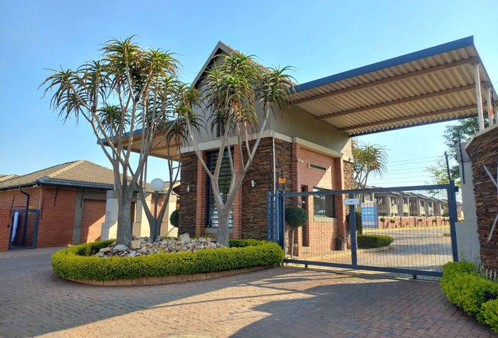 For Sale: Apartment in Pretoria West with security, car wash, and spacious living.