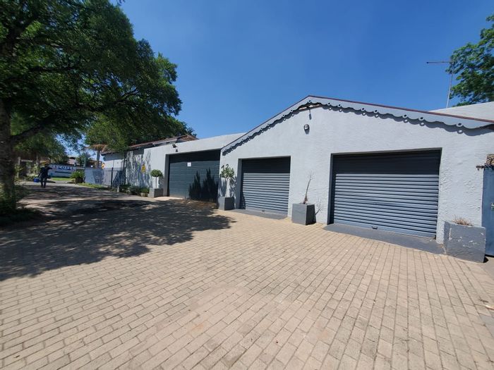 Versatile 6-bedroom house in Benoni South, for sale with dual kitchens and garages.