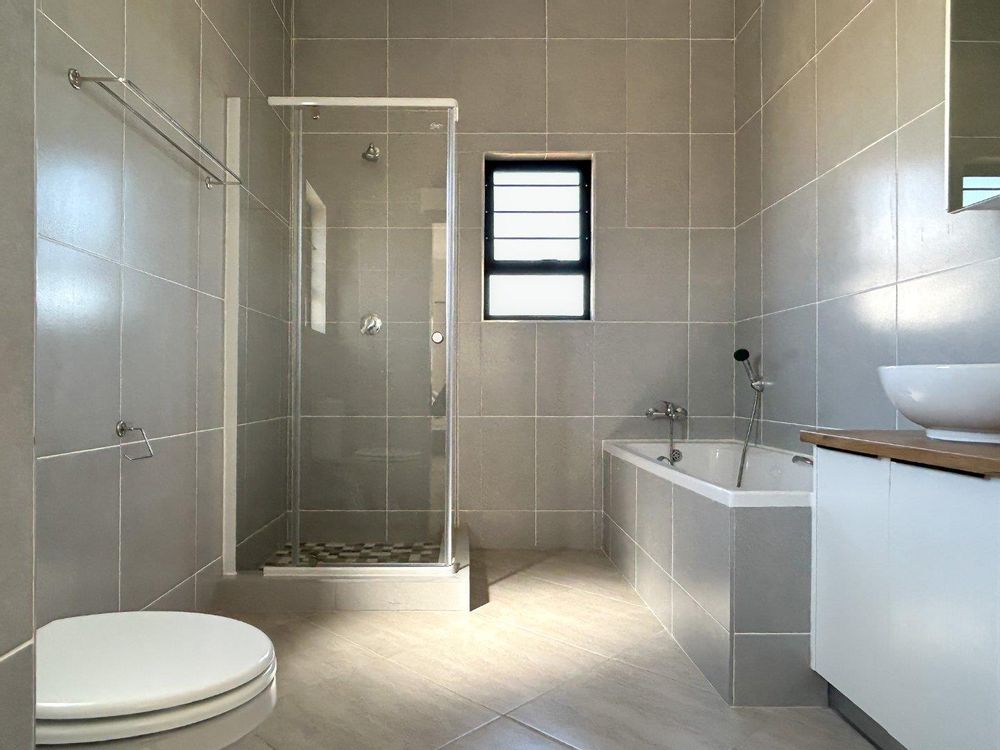 Ensuite bathroom with bath & shower for your convenience.