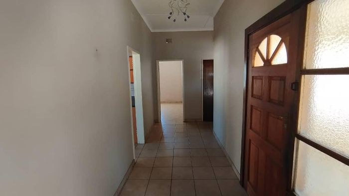House for Sale in Windhoek North: 3 Bedrooms, Double Garage, Bonus Flats Available.